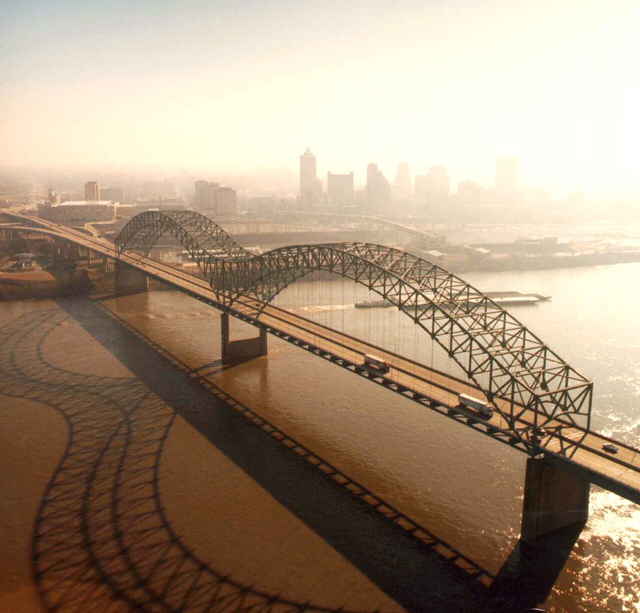 The Hernando de Soto Bridge over the Mississippi River from the air.